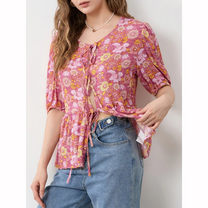 Blusa con escote en V y lazo con encaje floral