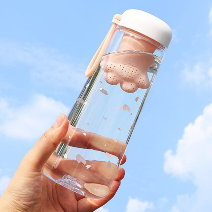 Bonita botella de agua de plástico con forma de garra de gato