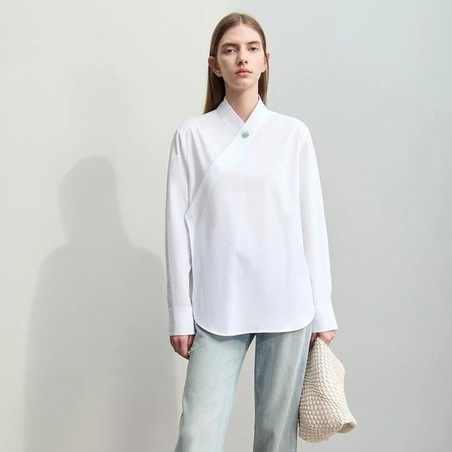 Elegante blusa holgada con cuello alto y estampado floral para mujer