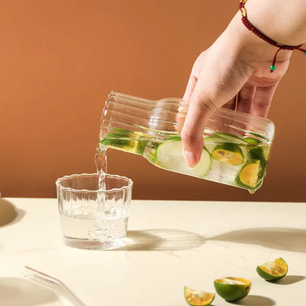 Juego de botella de agua de vidrio y taza de té