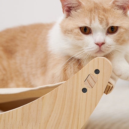 Cama mecedora de madera para gatos