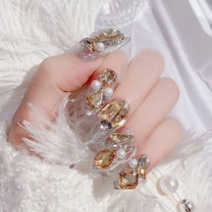 Faux ongles de luxe en cristal pailleté avec décor en strass doré