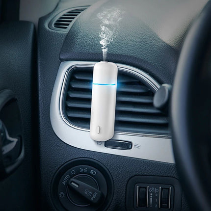 Luxurious Aroma Journey: Electric Waterless Car Perfume Diffuser with Vent Clip - Wnkrs