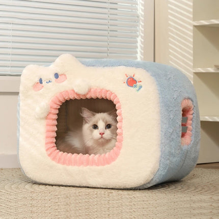 Acogedora cama para gatos con cojín