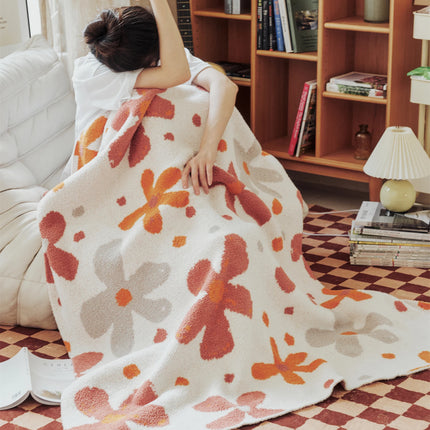 Couverture tricotée colorée à motifs floraux et duveteux pour les genoux