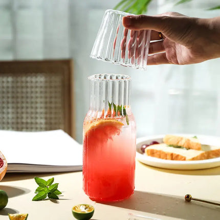 Juego de botella de agua de vidrio y taza de té