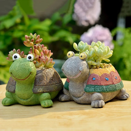 Bonita jardinera con forma de tortuga de dibujos animados para suculentas y cactus