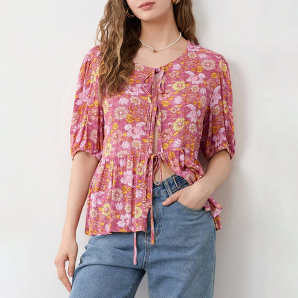 Blusa con escote en V y lazo con encaje floral