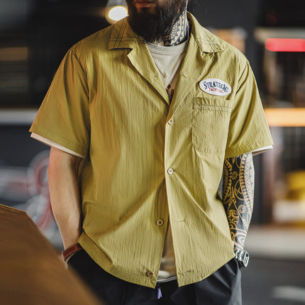 Camisa vintage de manga corta con cuello cubano y bordado