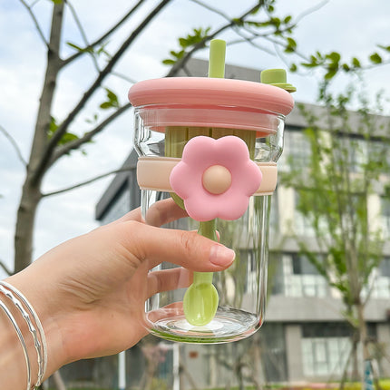 Vaso de cristal con forma de flor, tapa, pajita e infusor