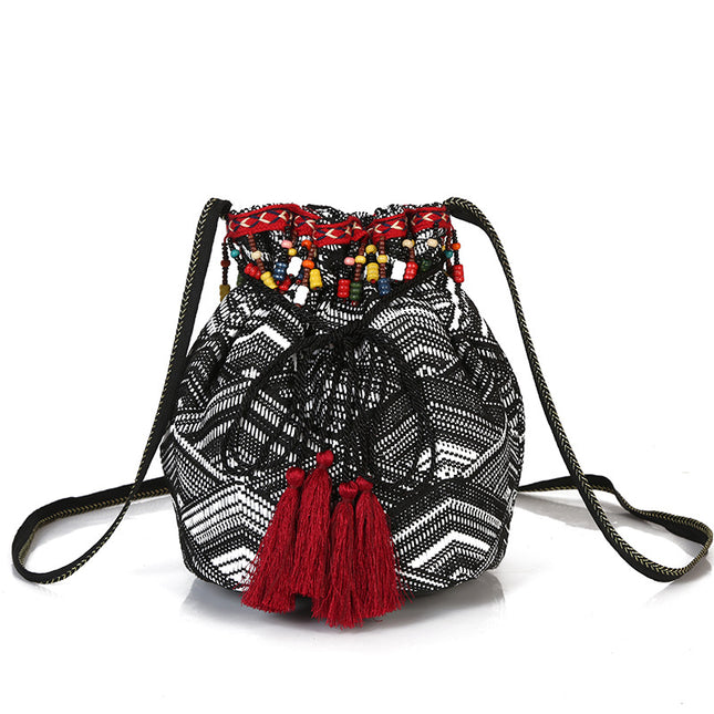 Beautiful Boho Style Crsossbody Bag with Tassel Decorations - Wnkrs